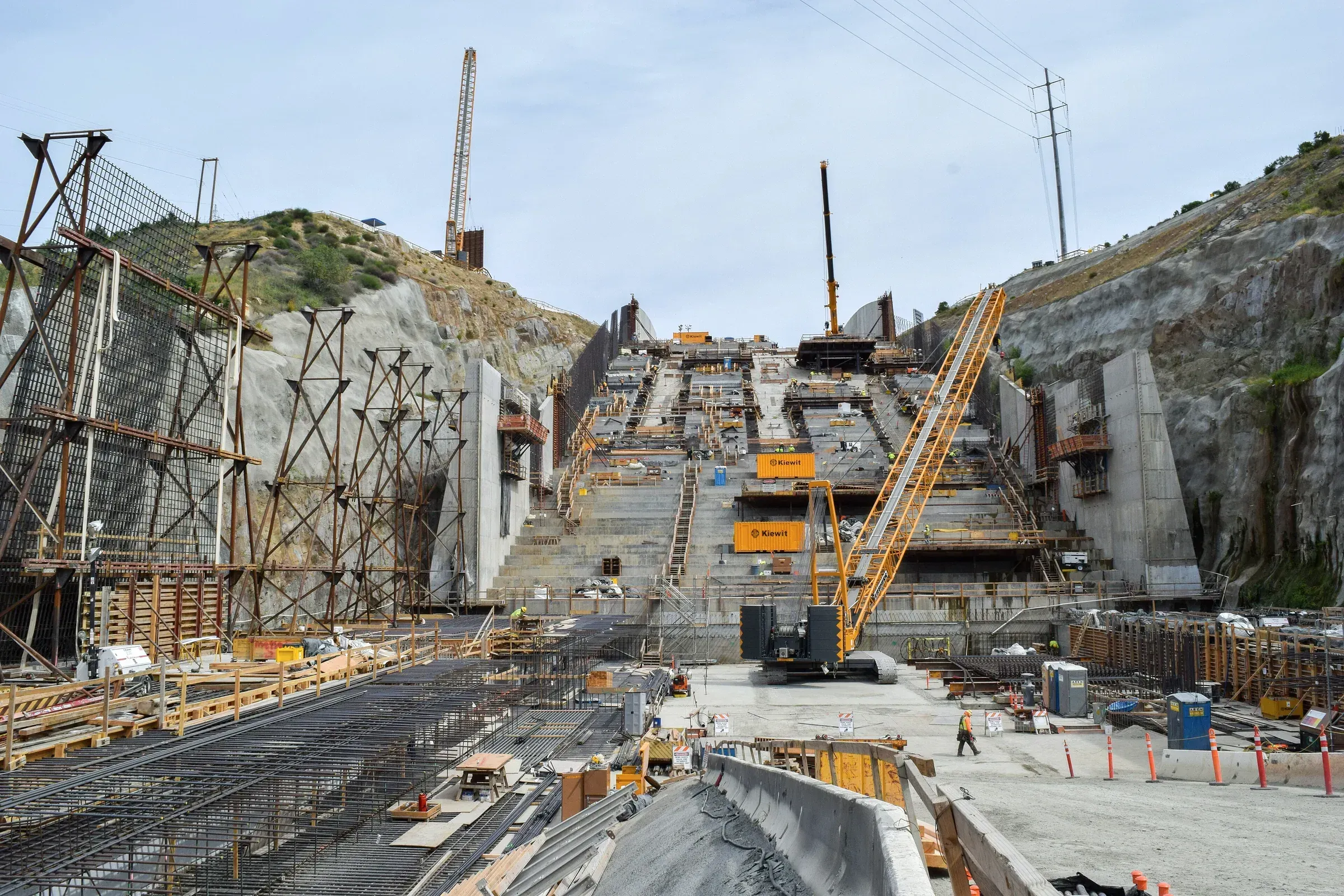 Cranes over the Folsom Dam auxiliary spillway under construction, California