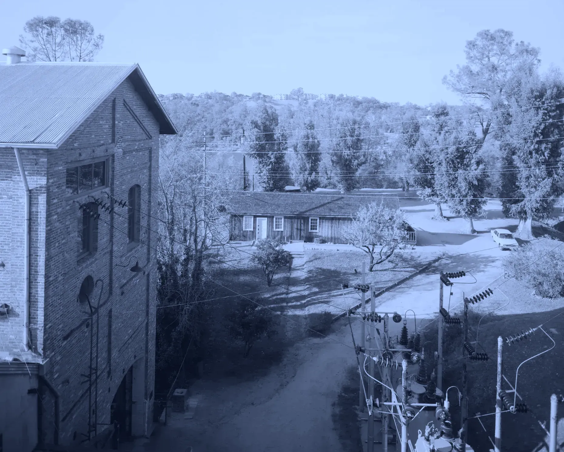 Powerhouse and blacksmith shop from top of dam, Folsom, California
